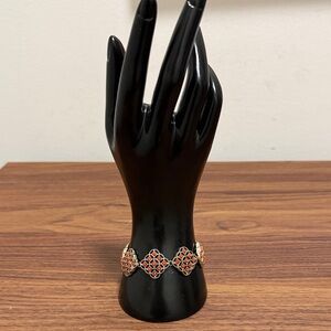 Gold Tone Link Bracelet with Coral Colored Beads in a Quatrefoil Motif. Vintage.